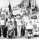 Protestors in Jefferson County, KY march against court-ordered school desegregation busing on August 31, 1976. Image via AP Photo.